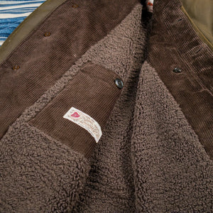 Baracuta G10 Waxed Cotton Coat Deep Moss Teddy Lined worn front close up lining and inner pcoket