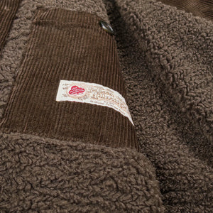 Baracuta G10 Waxed Cotton Coat Deep Moss Teddy Lined worn front close up woven label inner pocket