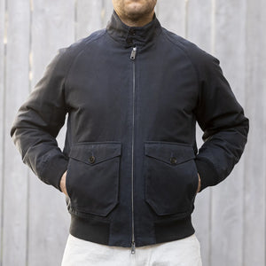 Baracuta G9 Waxed Pocket Jacket Lined Authentic Fit Dark Navy worn front hands in pocket