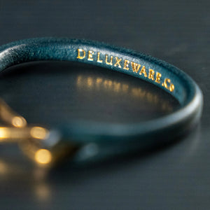 Deluxeware Steerhide Navy Leather Bracelet Solid Brass Hook Close up embossing