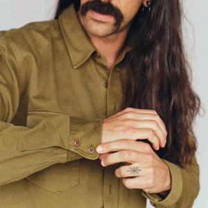 Indigofera Alamo Twill Shirt Military Olive close up sleeve and cuff worn