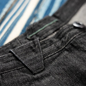 MotivMfg Pleat Herringbone Denim Trousers Black Classic Straight triangle belt loop detail