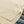 MotivMfg Supima Cotton Silk Shuttle TShirt Ivory close up side slits