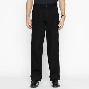 Naked and Famous 12 ounce Sugiaya Dobby Herringbone Pleated Trouser Black Sugiaya Relaxed Straight worn front