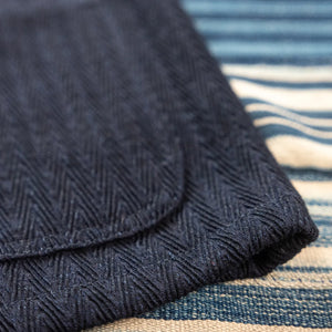 Naked And Famous 12oz Sugiaya Herringbone Chore Coat Indigo Dyed close up hem