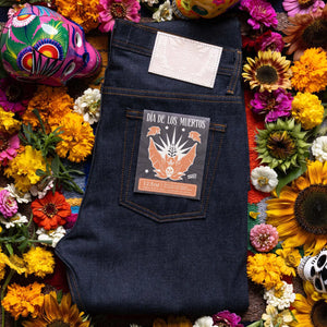 Naked and Famous 12 ounce Dia de los Muertos Selvedge Jeans Weird Guy Regular Tapered folded