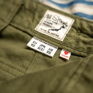 OrSlow Women Back Sateen Fatigue Shorts Dark Olive close up woven label