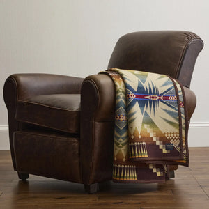Pendleton Jacquard Blanket Mystic Lake Hangs over an armchair