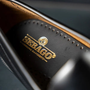 Sebago Otis Woven Penny Loafer Black close up inner sole with sebago logo
