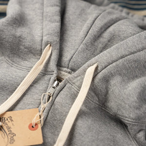 Strike Gold 20oz Loopwheeled Zip Hoodie Heather Gray close up closed zipper