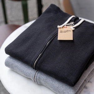 Strike Gold 20oz Loopwheeled Zip Hoodie Heather Gray and black folded