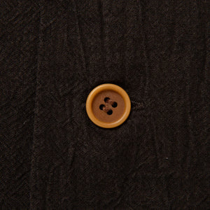 Studio D Artisan 5739 Amami Oshima Mud Dyed 13oz Cotton Linen Shirt Dark Brown close up nut button