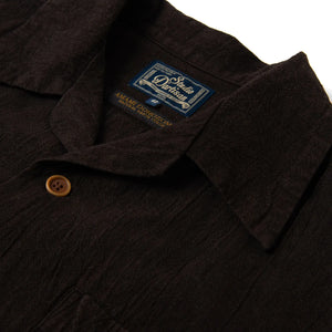 Studio D Artisan 5739 Amami Oshima Mud Dyed 13oz Cotton Linen Shirt Dark Brown close up woven neck label
