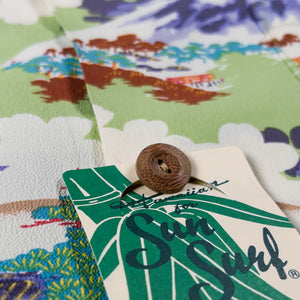 Sun Surf Ancient Capital Rayon Crepe Hawaiian Shirt Green close up bamboo button