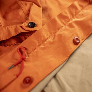 Ten C 13oz OJJ Anorak Jacket Orange close up button front