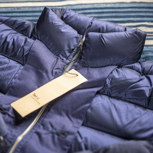 Ten C Down Liner Jacket Navy close up collar zip closed