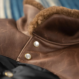 Warehouse Co with Rocky Mountain Featherbed Lot2235 Christy Down Vest Black close up collar closed